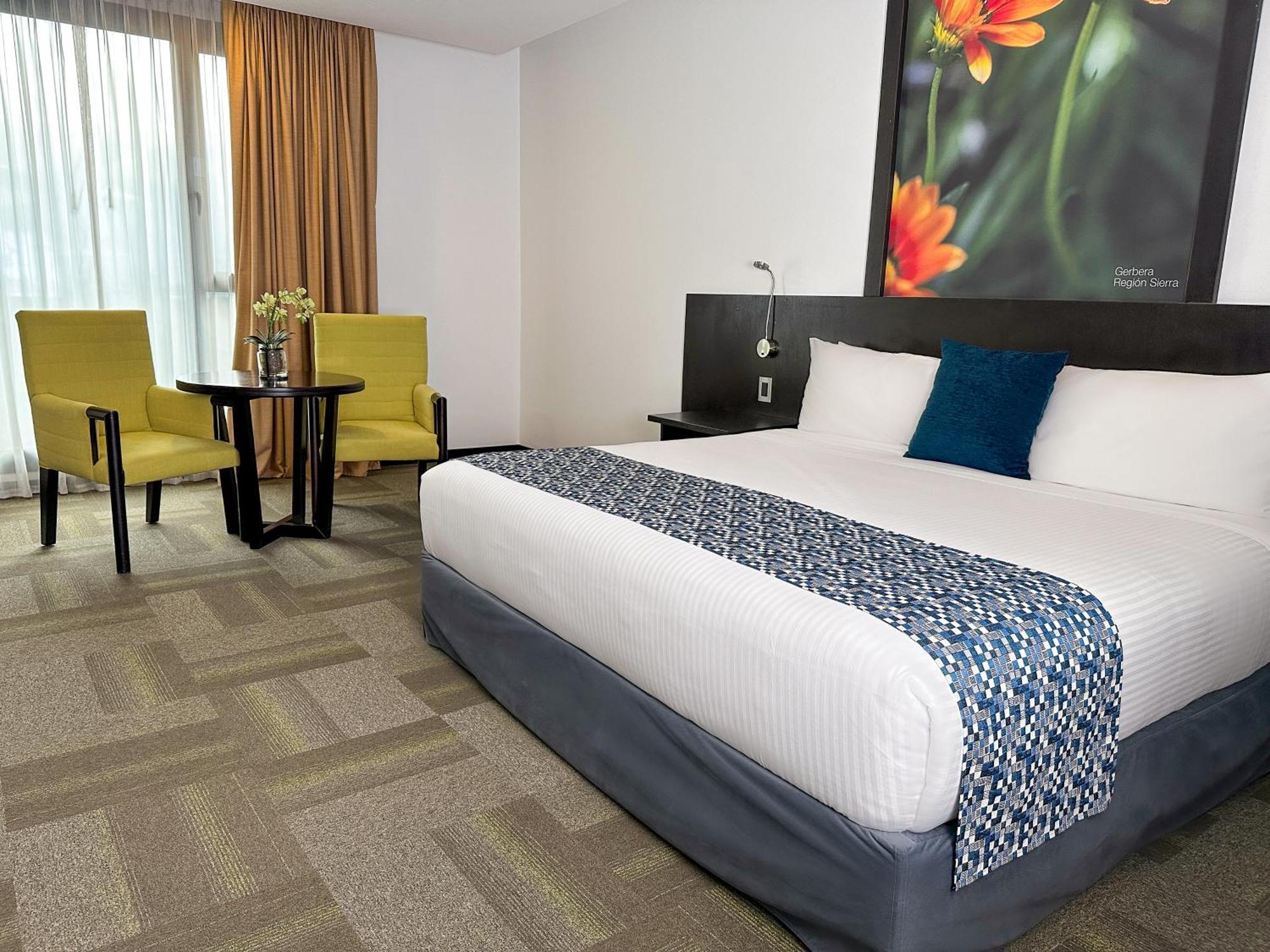 Wyndham Quito Airport Hotel Puembo Ngoại thất bức ảnh A room at the hotel